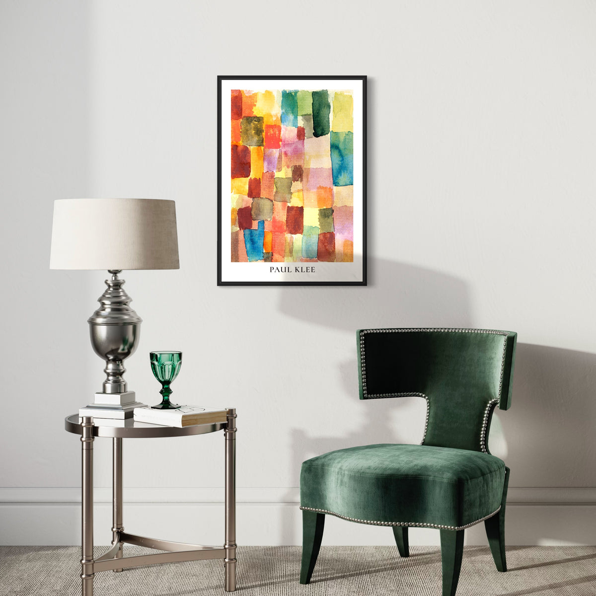Modern living room with abstract colorful Paul Klee poster, green velvet chair, side table, lamp