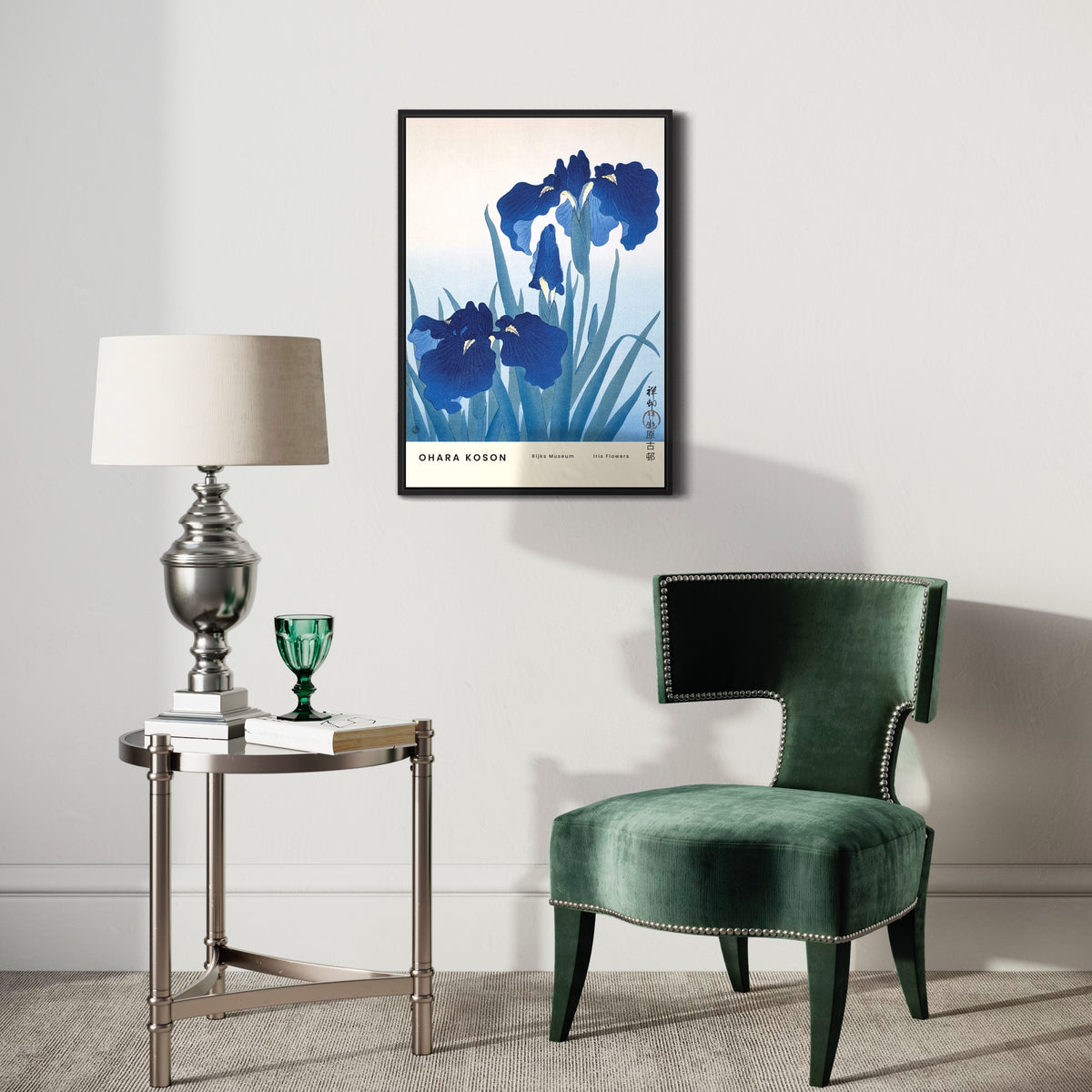 Modern living room with green velvet chair, side table, and framed blue iris flower poster on wall