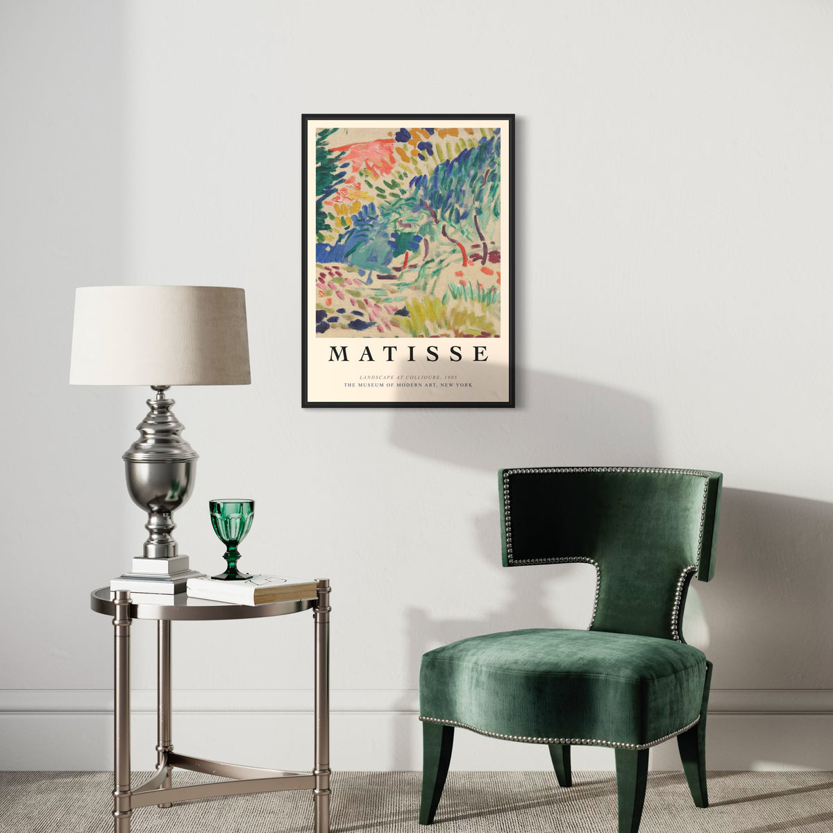 Modern living room with Matisse art poster, green velvet chair, silver lamp and side table