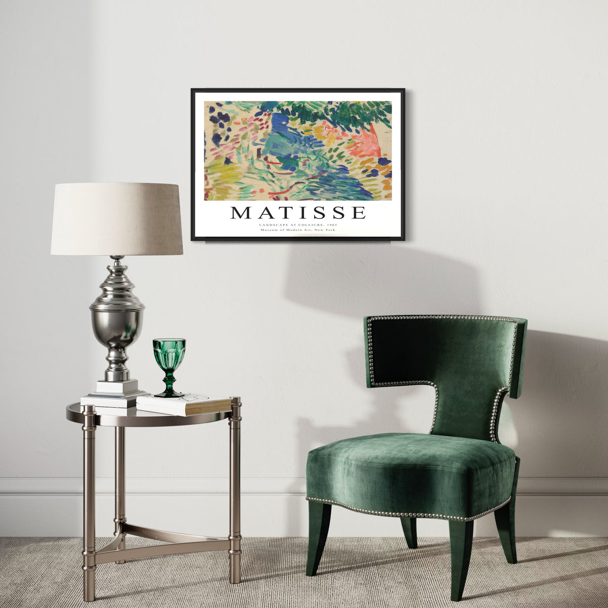 Modern living room with Matisse art poster, green velvet chair, metallic side table, and lamp