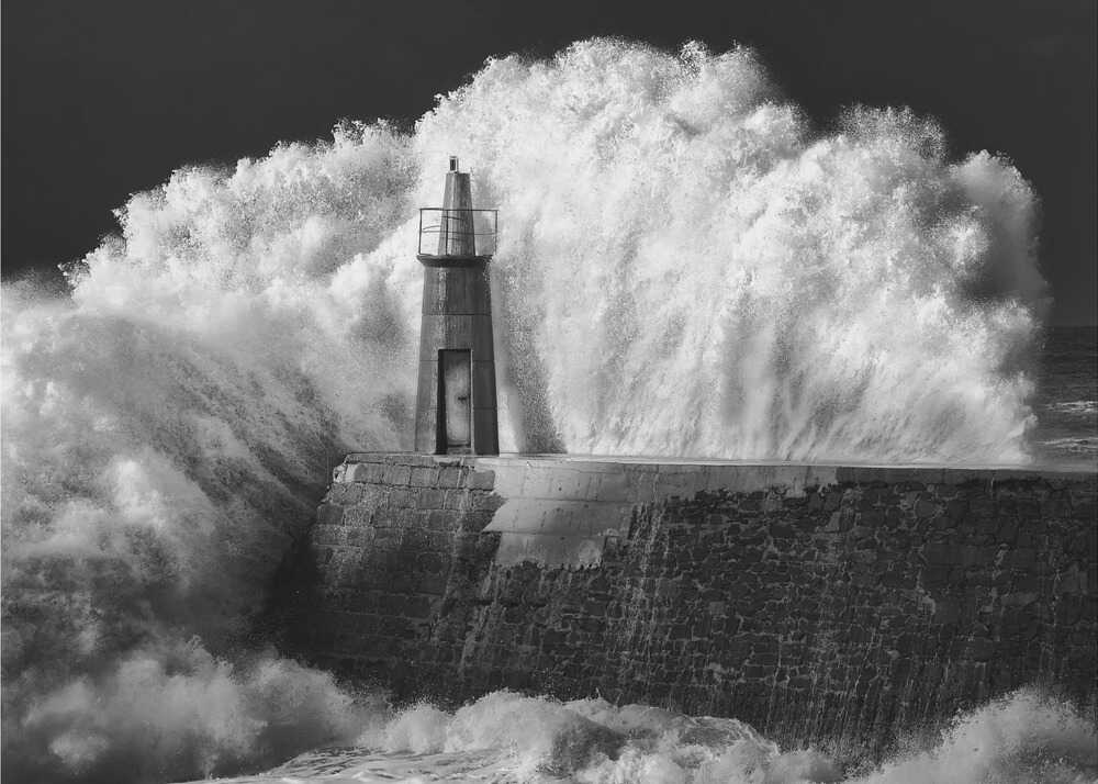 Lighthouse wave poster with a black and white view of a lighthouse on a pier hit by a massive wave