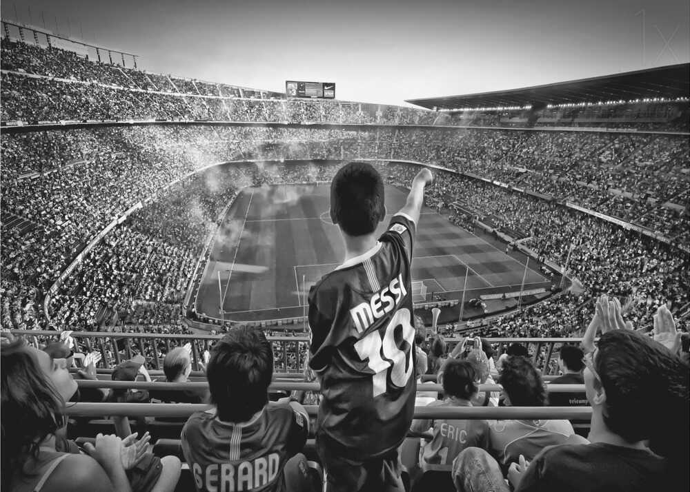 Messi stadium poster with a black and white view of a crowded football stadium and a boy in a Messi jersey