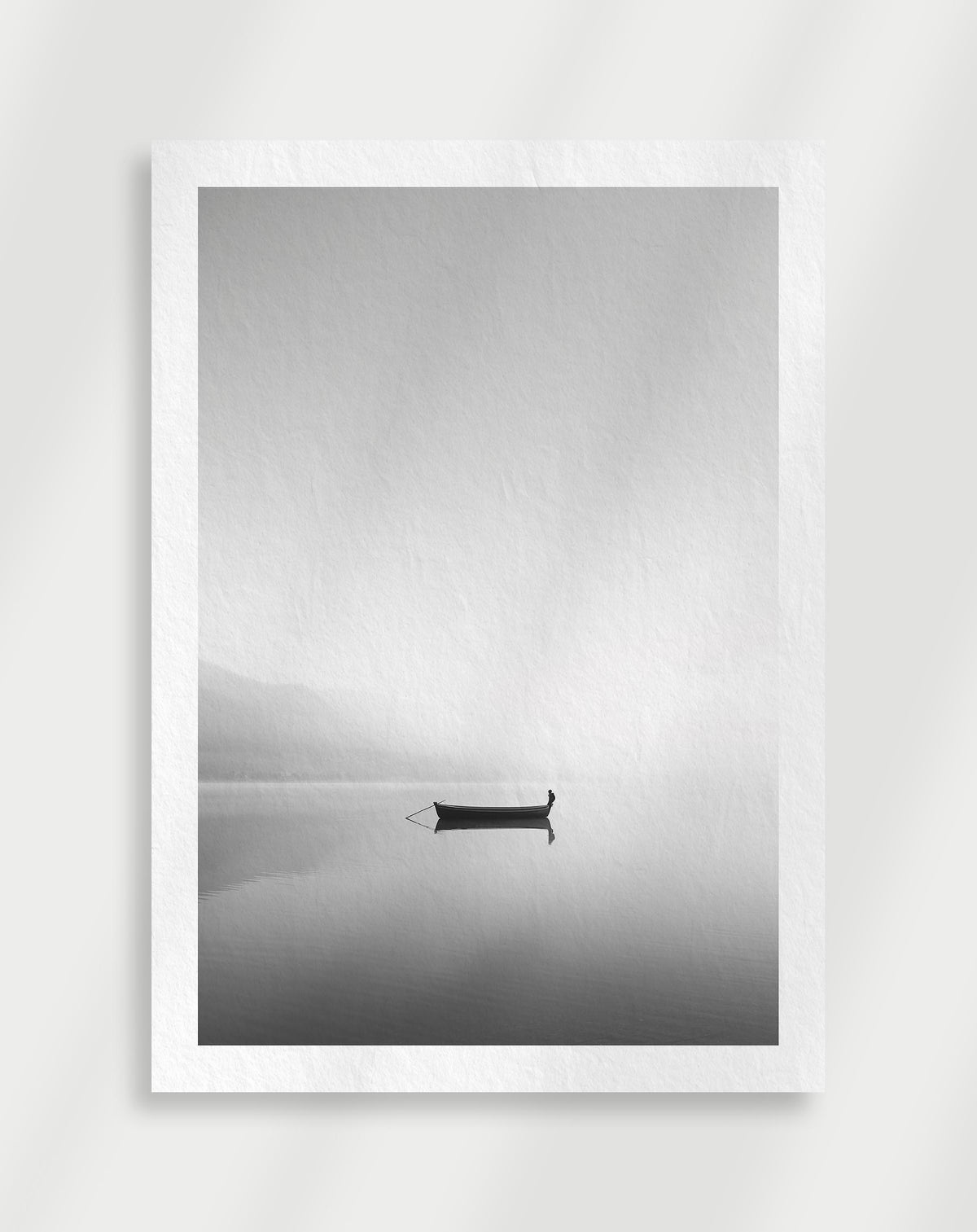 Minimal misty boat poster with a black and white view of a small boat on a foggy lake