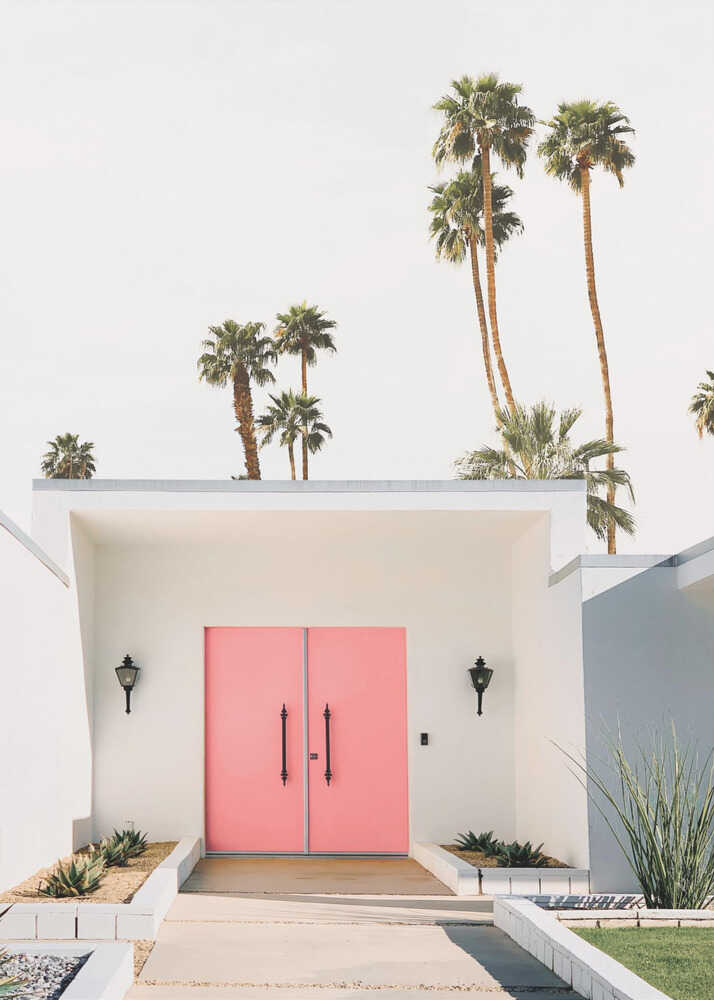 Pink door palms poster with a mid-century house with a pink double door and palm trees
